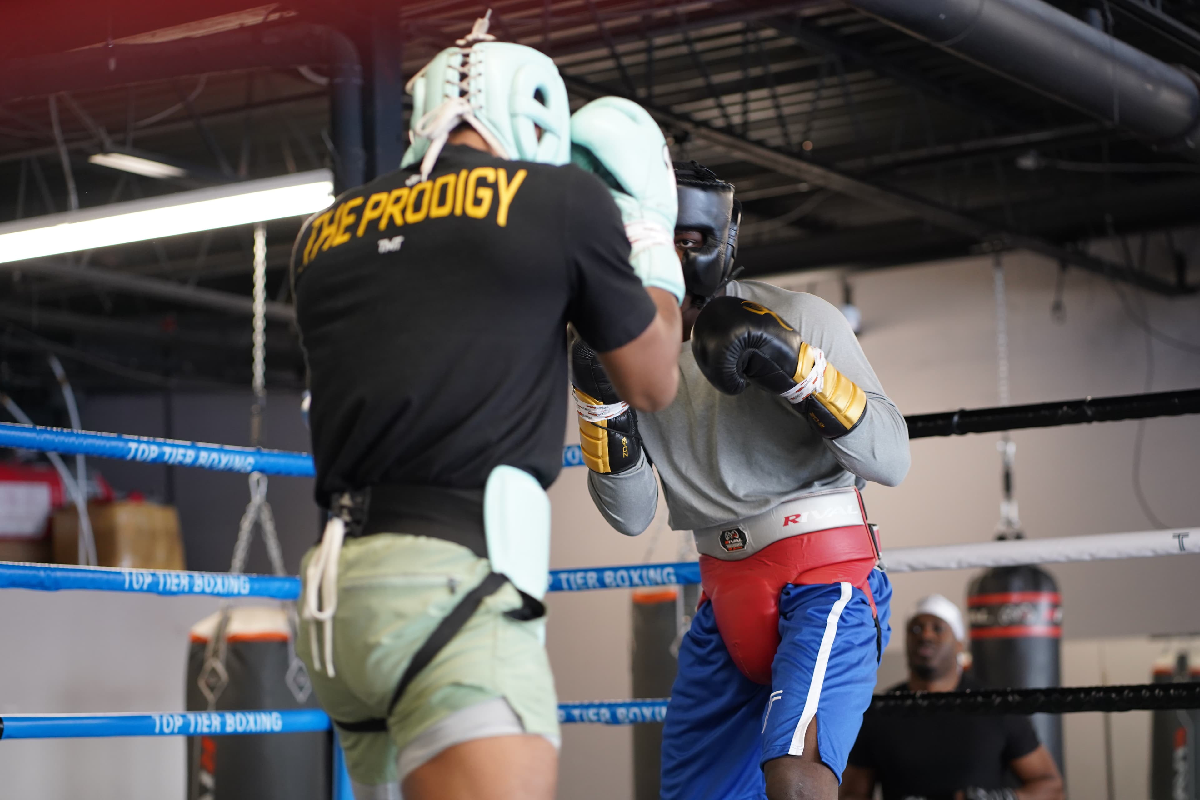 Boxeur dans son coin entre les rounds